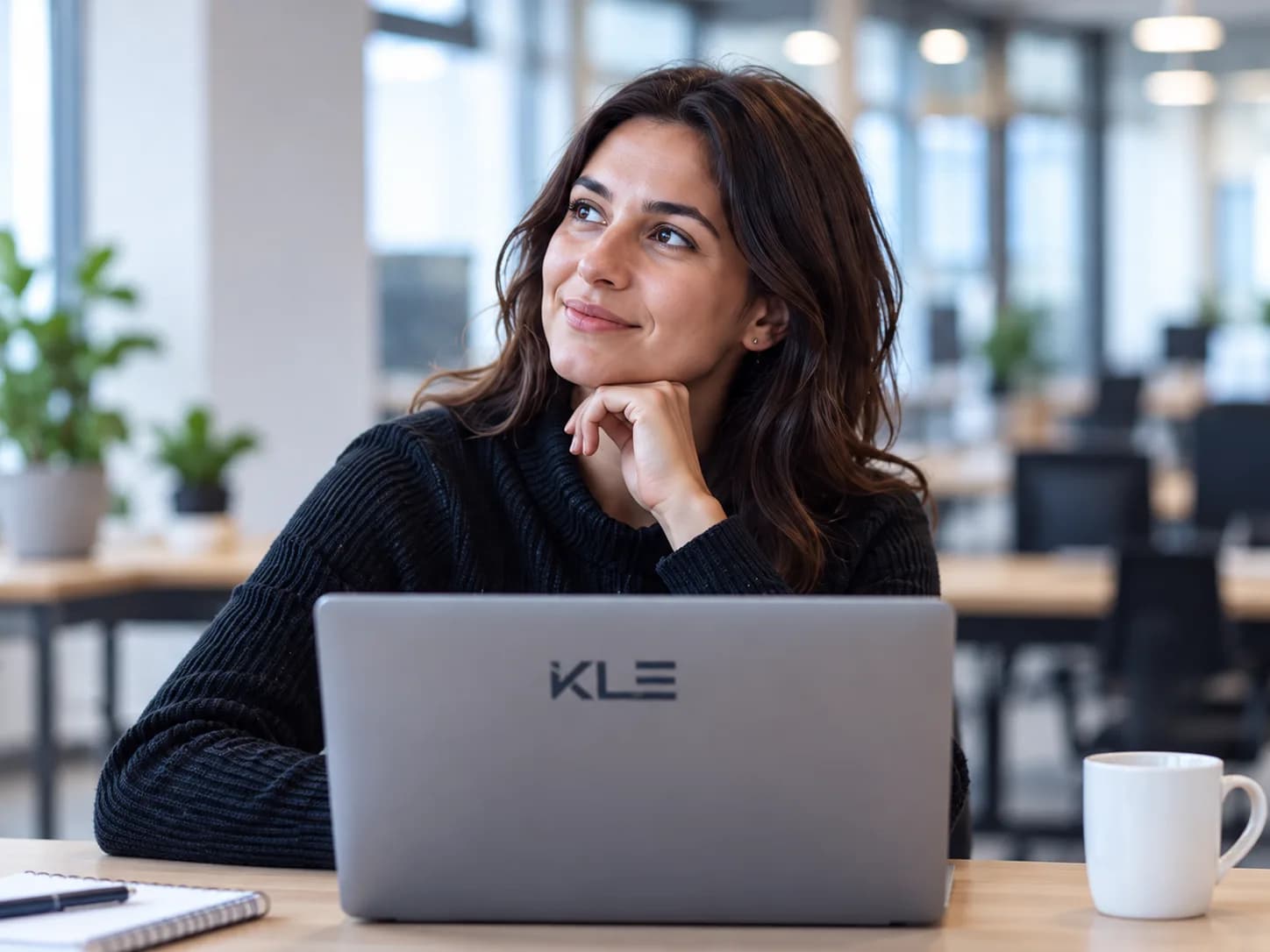 A career changer considering their training plans in front of their computer.